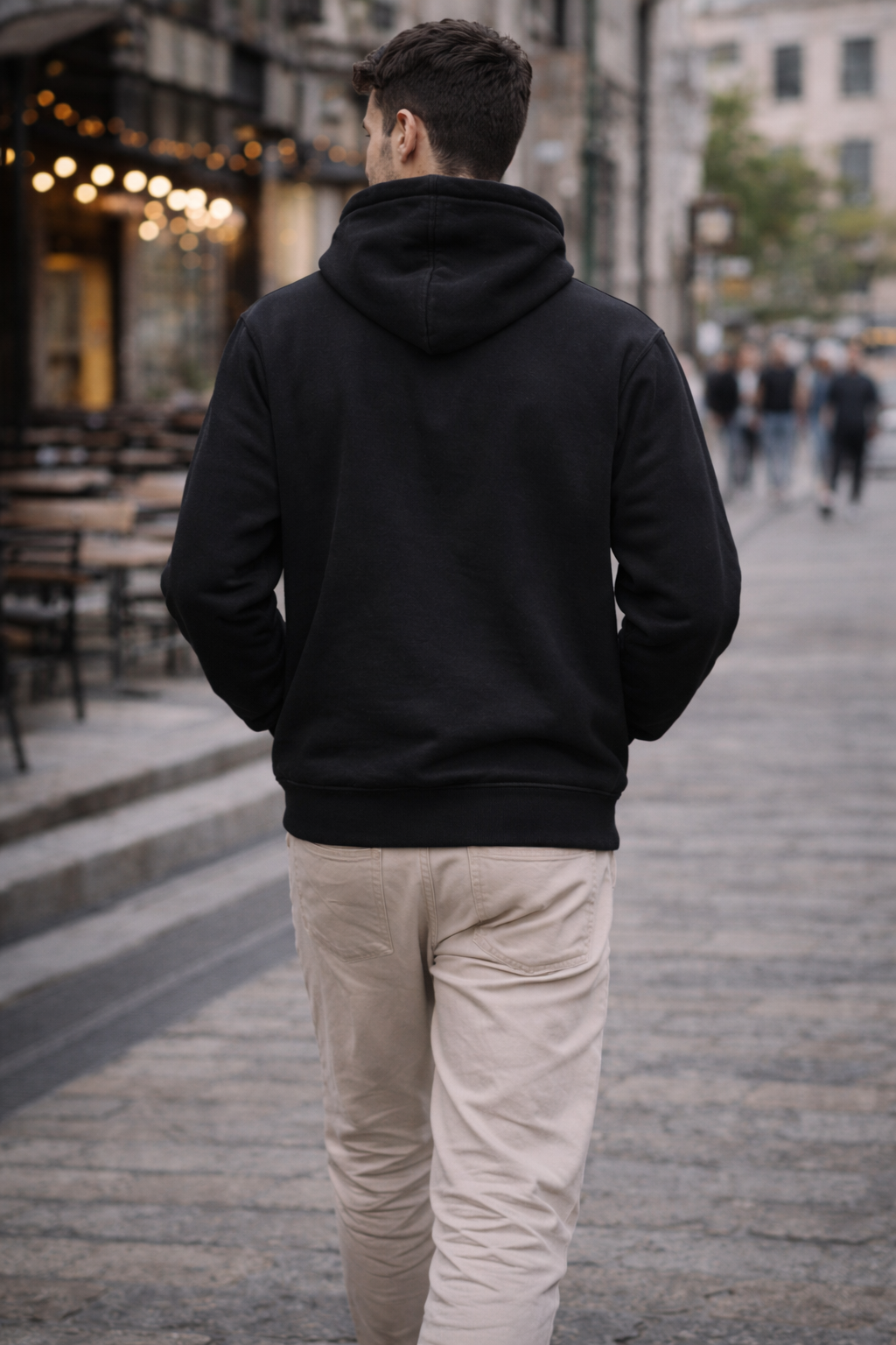 Back view of men's black winter hoodie featuring premium fabric and modern fit.